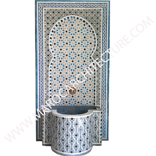Moroccan mosaic fountain by Maroc Architecture et Zellij